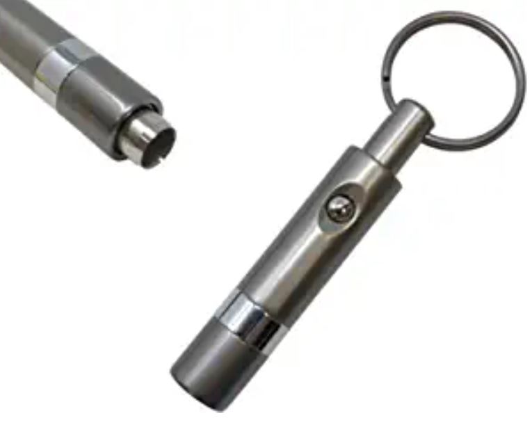 ACCESSORIES Push button retractable cigar punch