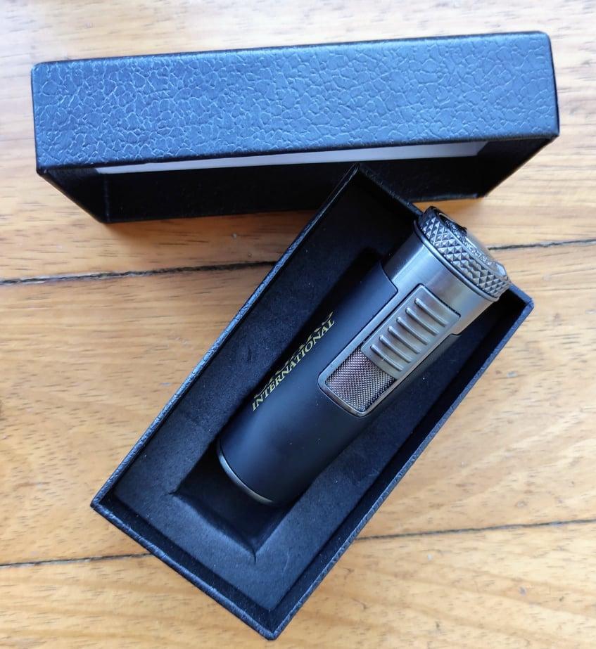 ACCESSORIES Smiley Quad Torch Lighter (in box) /Flame Type: Quad Torch Color: Black Ignition Type: Piezo Refillable